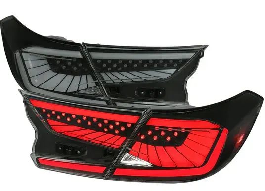 Injection molded taillight with holographic light effects